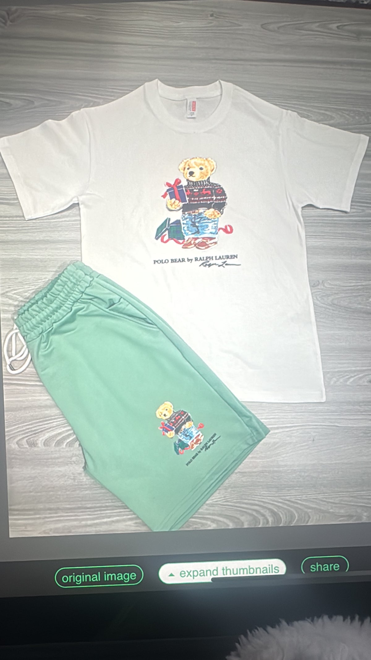 White bear graphic T-shirt and green shorts set